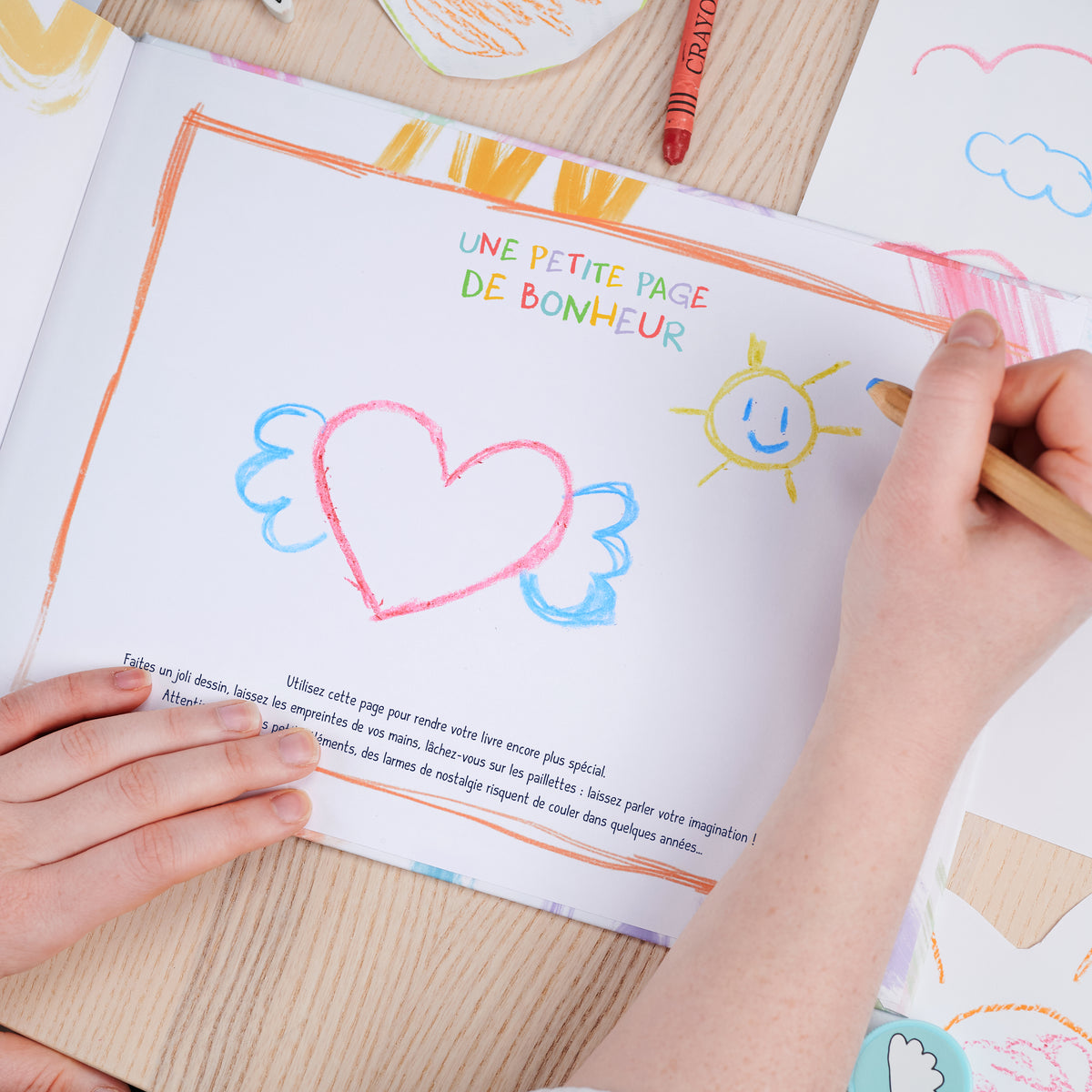 La dernière page est dédiée à un petit dessin de l'enfant, dans ce livre personnalisé pour Maman.